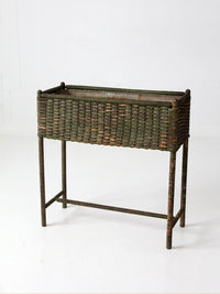 antique green painted wicker jardinière planter with metal liner