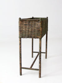antique green painted wicker jardinière planter with metal liner