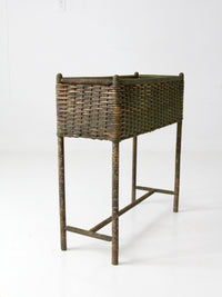 antique green painted wicker jardinière planter with metal liner