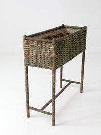 antique green painted wicker jardinière planter with metal liner
