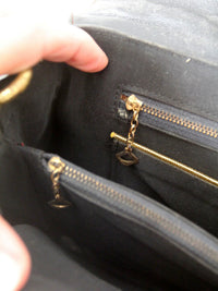 vintage 1970s Rolfs black leather shoulder bag