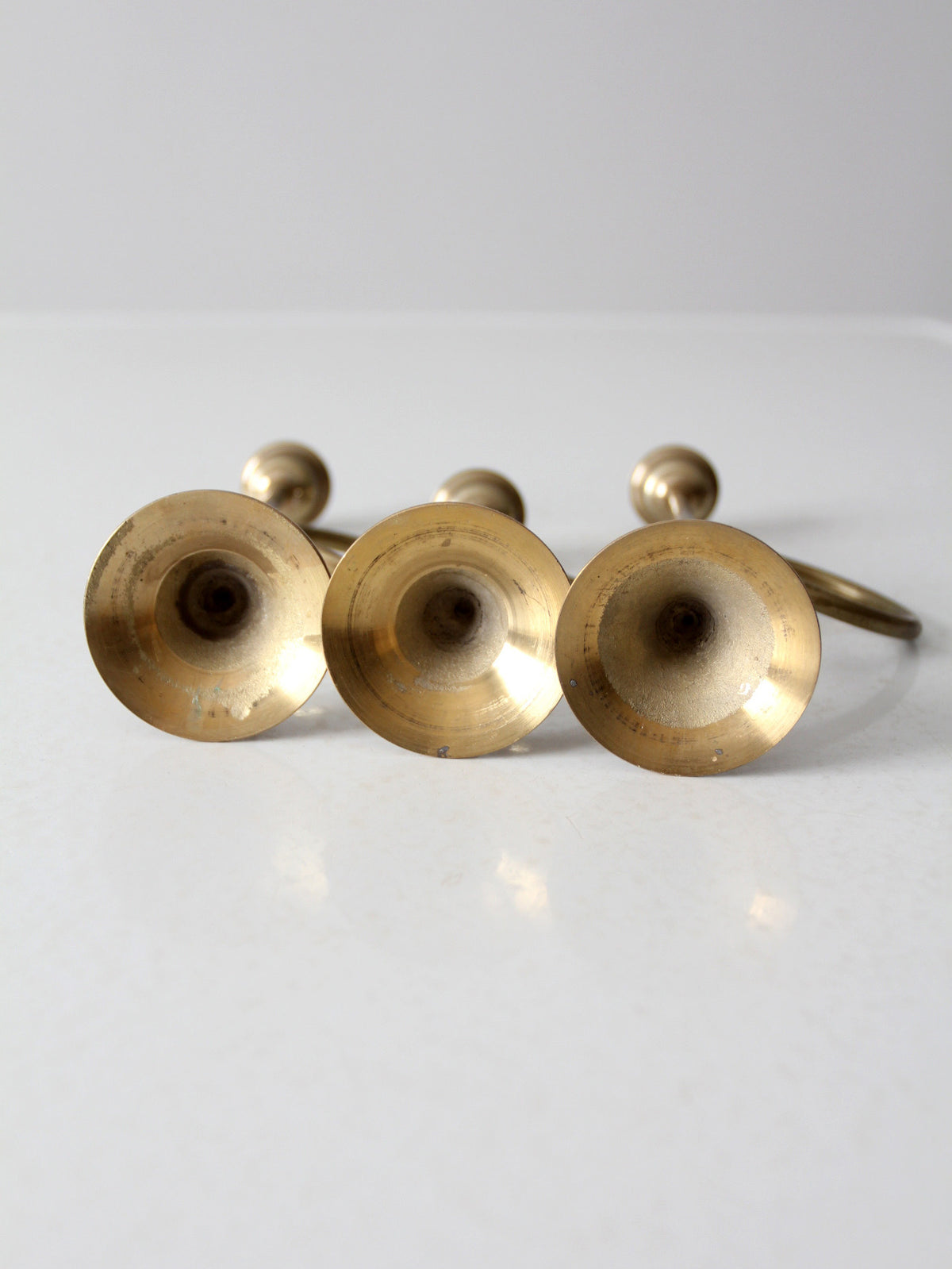vintage modernist brass loop candlesticks | set of three