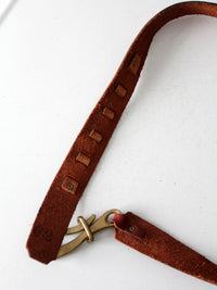vintage leather belt with sculptural brass hook buckle