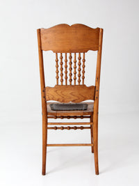 antique Victorian Eastlake chair with embossed leather seat