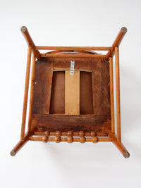 antique Victorian Eastlake chair with embossed leather seat