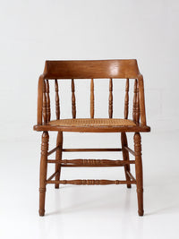 antique cane seat captain's chair