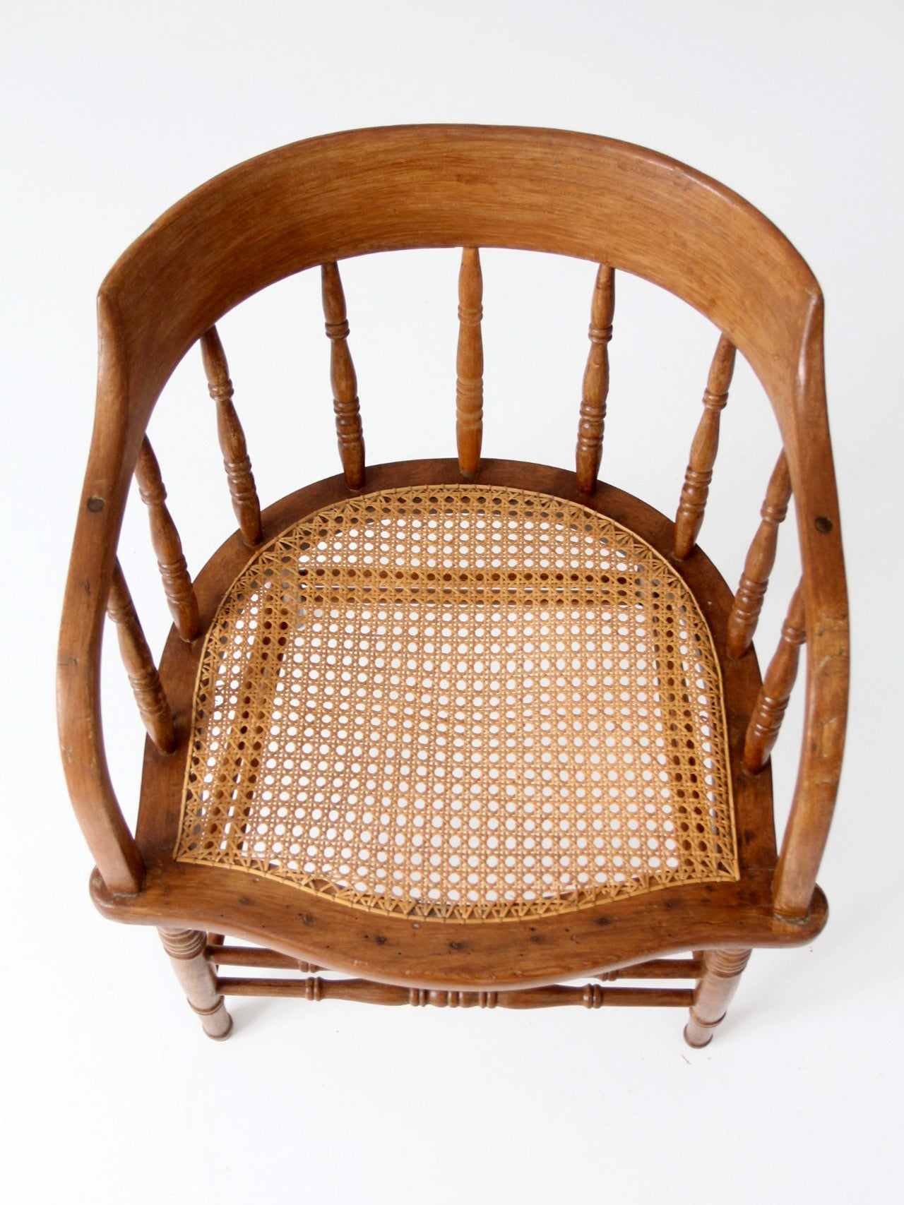 antique cane seat captain's chair