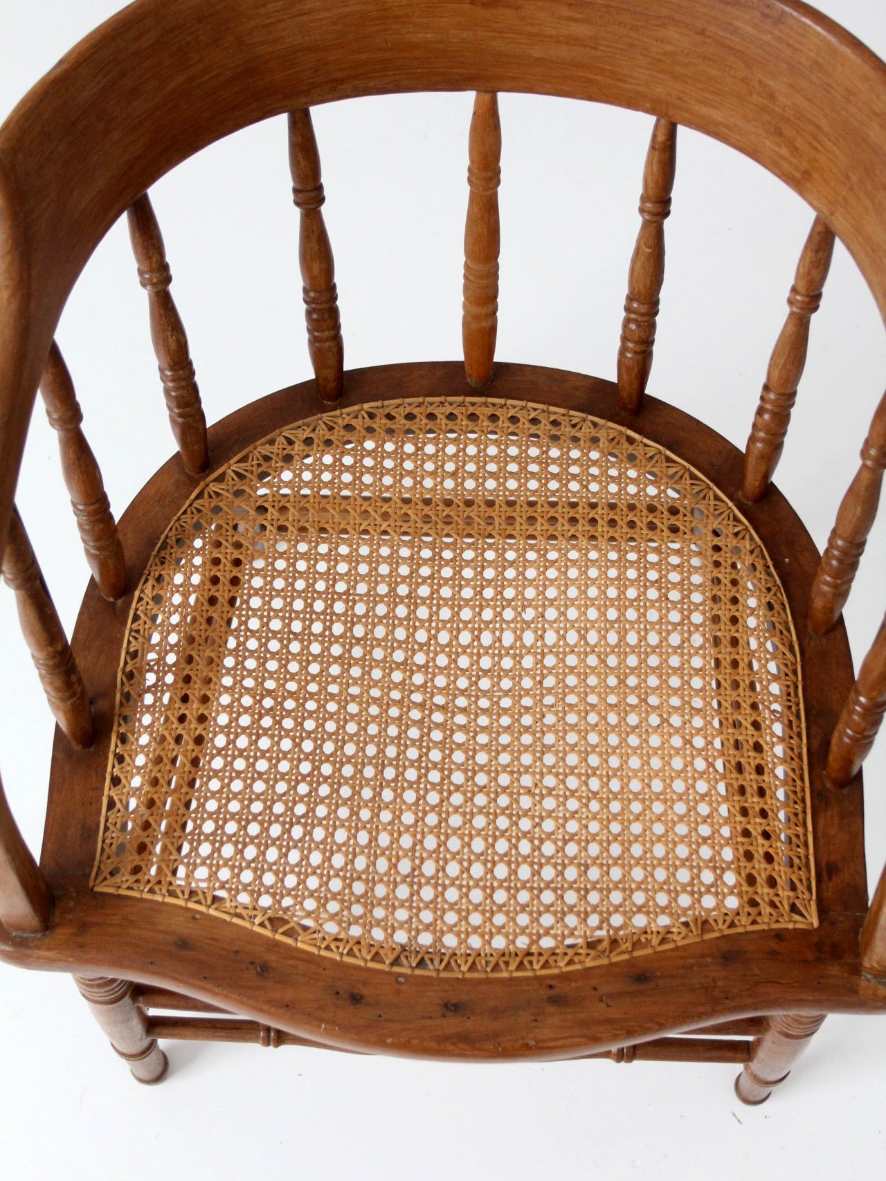 antique cane seat captain's chair