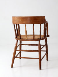 antique cane seat captain's chair