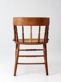 antique cane seat captain's chair