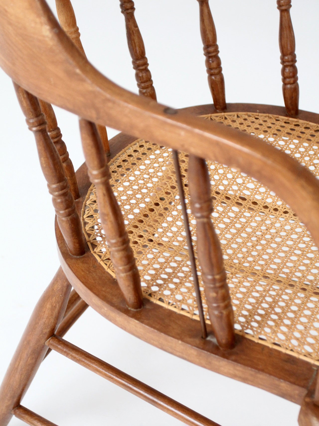 antique cane seat captain's chair