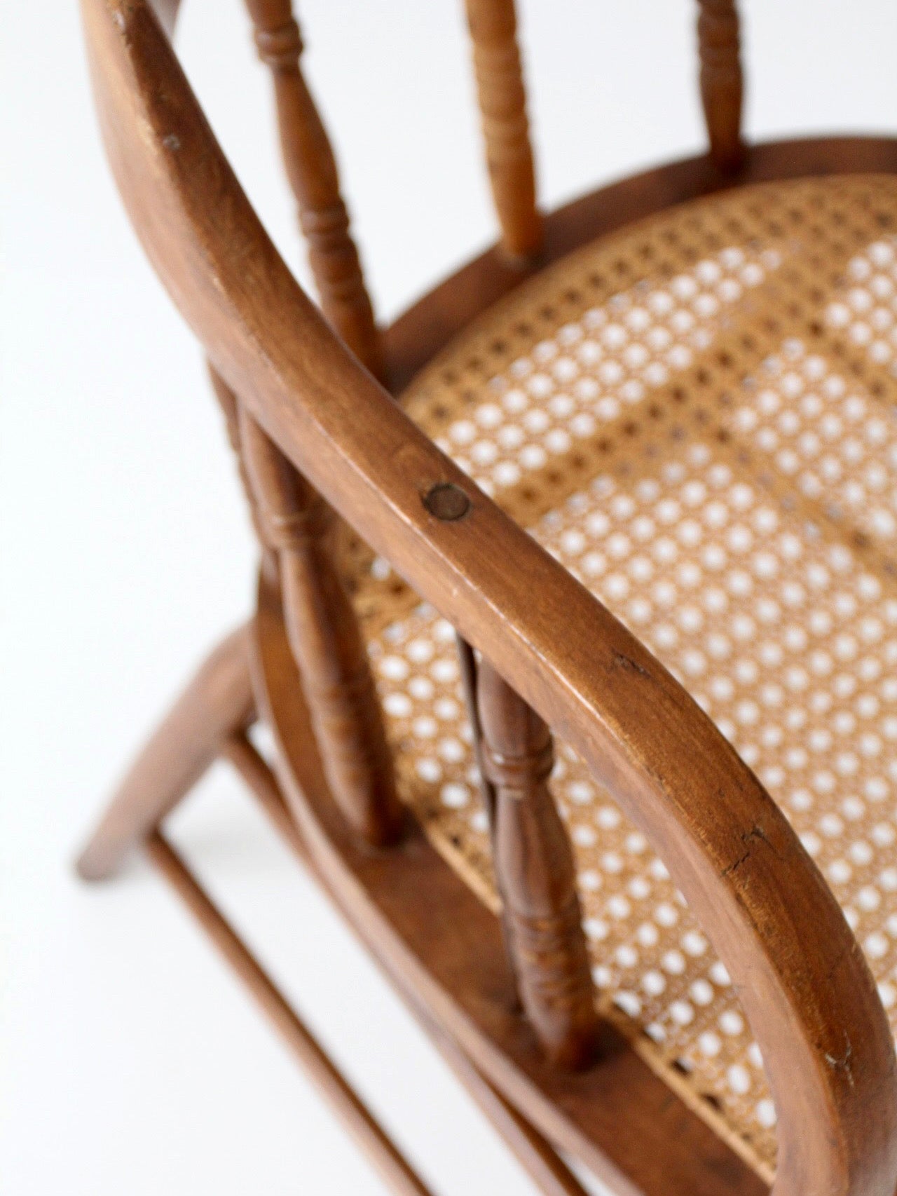 antique cane seat captain's chair