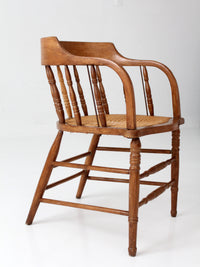 antique cane seat captain's chair