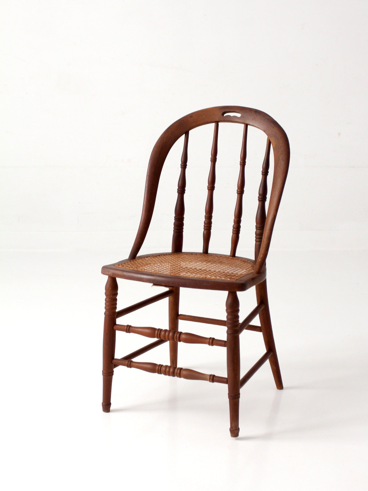 antique Windsor bow back chair with cane seat