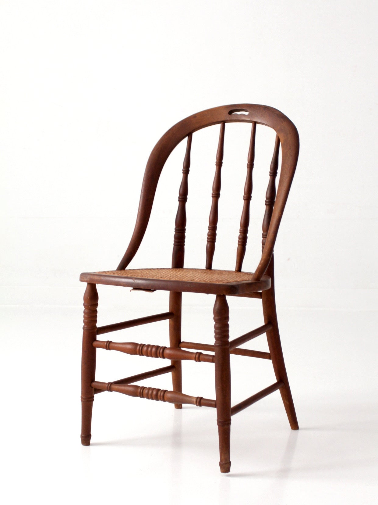antique Windsor bow back chair with cane seat