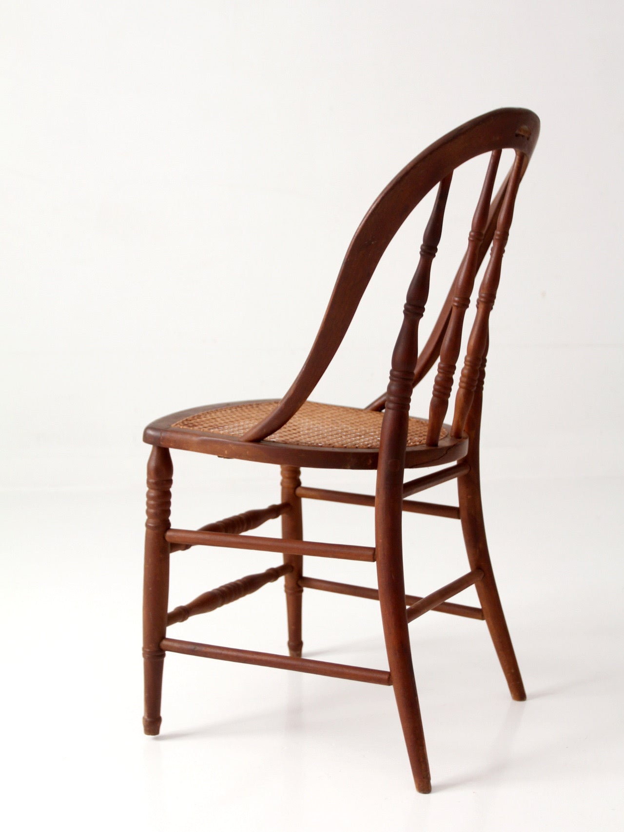 antique Windsor bow back chair with cane seat