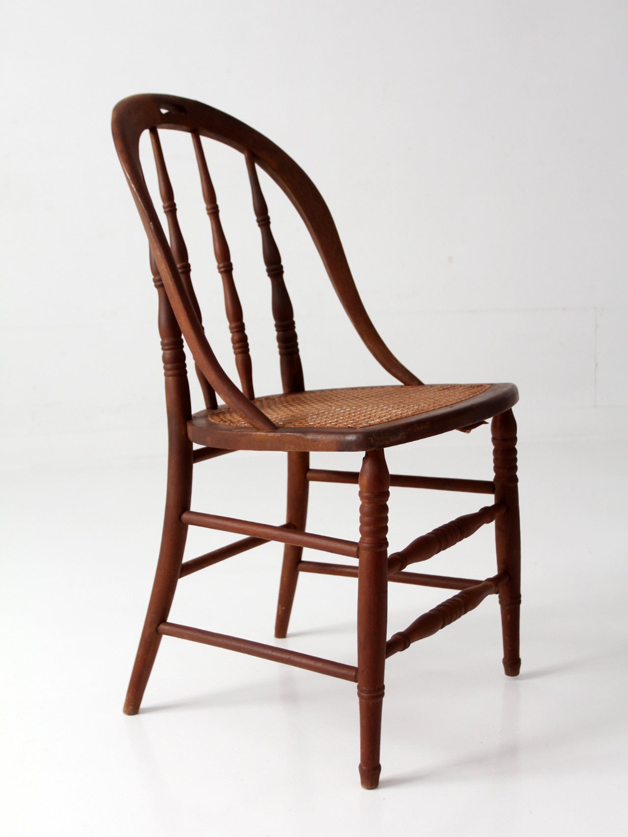 antique Windsor bow back chair with cane seat