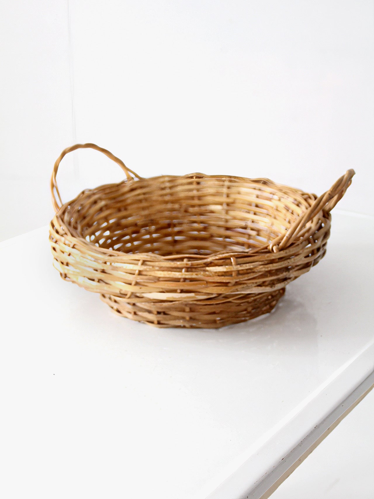 vintage round wicker basket with handles