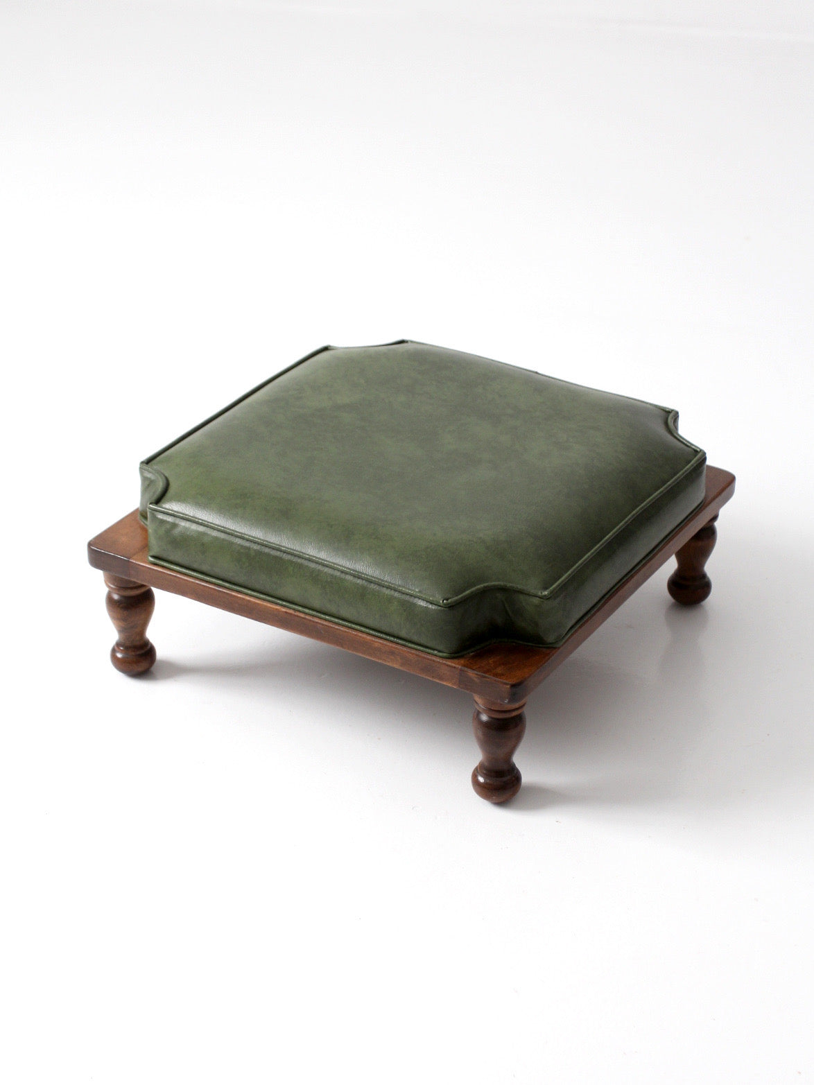 mid-century Colonial Revival footstool with green cushion