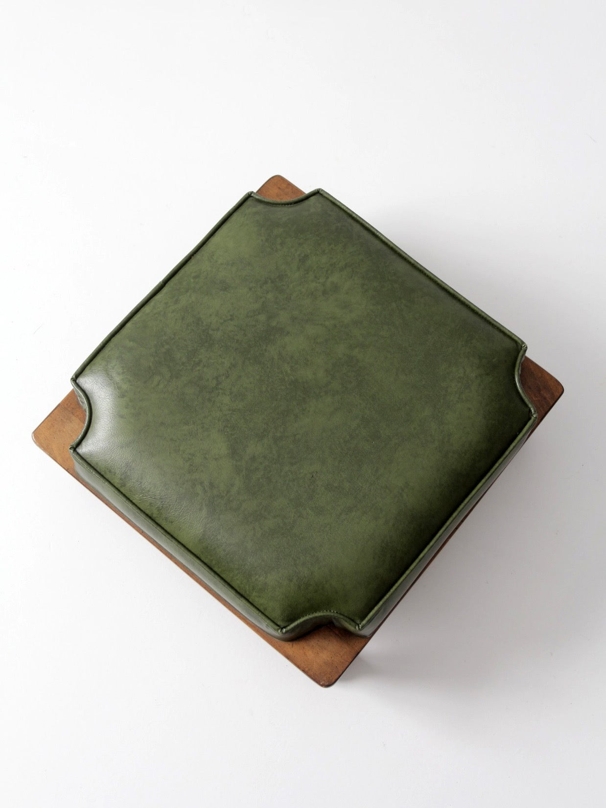 mid-century Colonial Revival footstool with green cushion