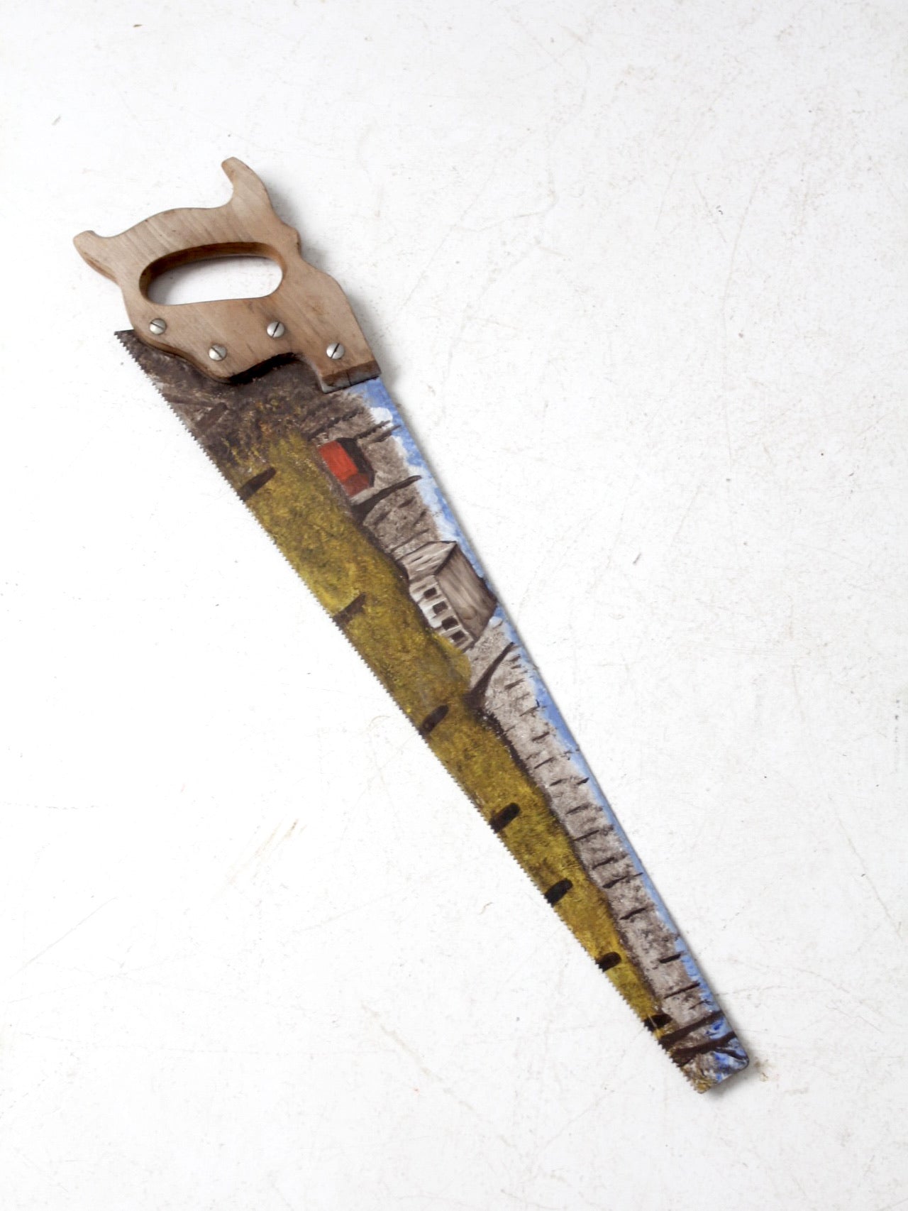 vintage painted saw