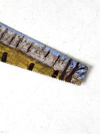 vintage painted saw