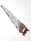 vintage painted saw