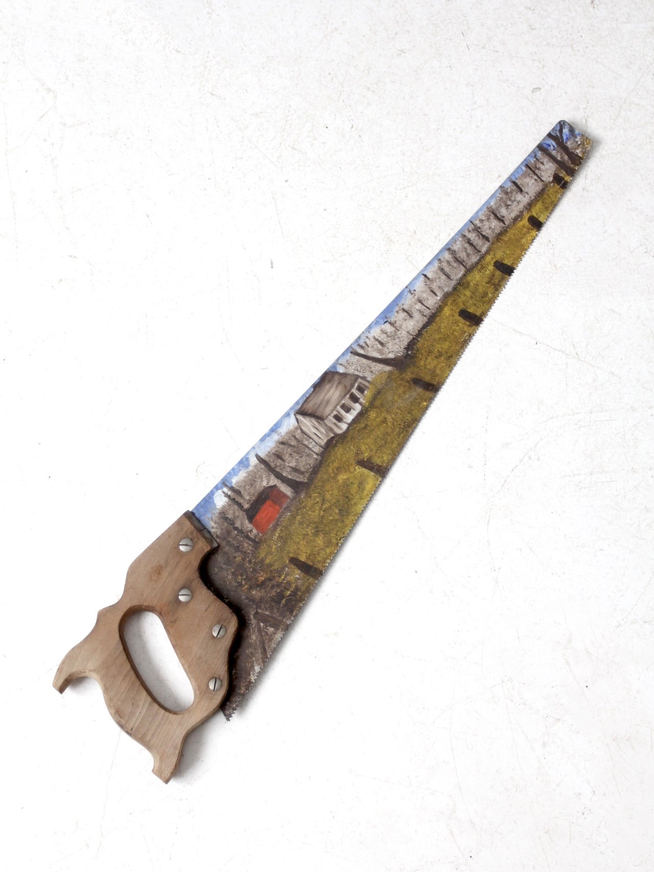 vintage painted saw