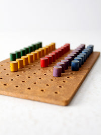 mid-century wooden peg board toy