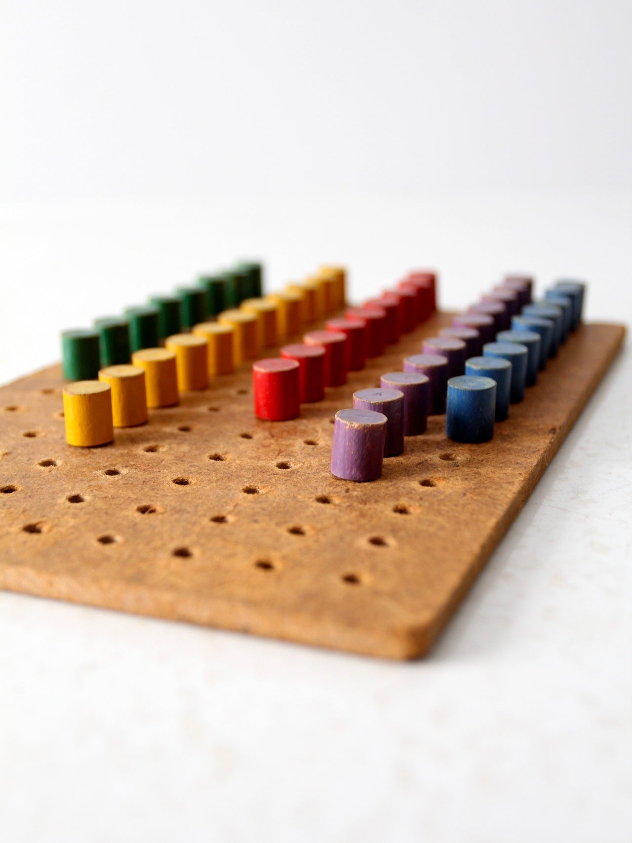 mid-century wooden peg board toy