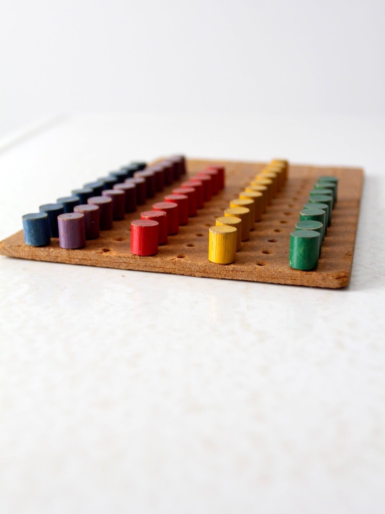 mid-century wooden peg board toy