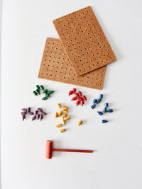 mid-century wooden peg board toy
