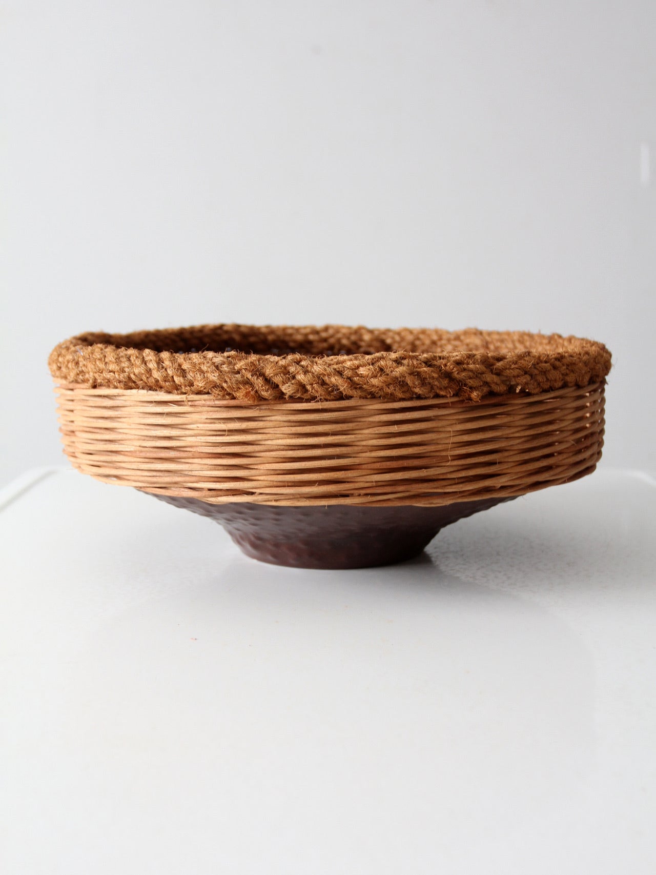 vintage copper and wicker bowl