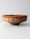 vintage copper and wicker bowl