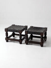 mid-century Spanish Revival leather strap stools pair