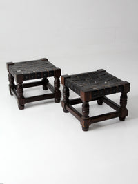 mid-century Spanish Revival leather strap stools pair