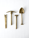 mid-century mini figurative brass tool set
