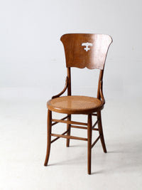 early 1900s bentwood chair with caned seat