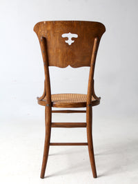 early 1900s bentwood chair with caned seat