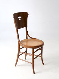 early 1900s bentwood chair with caned seat