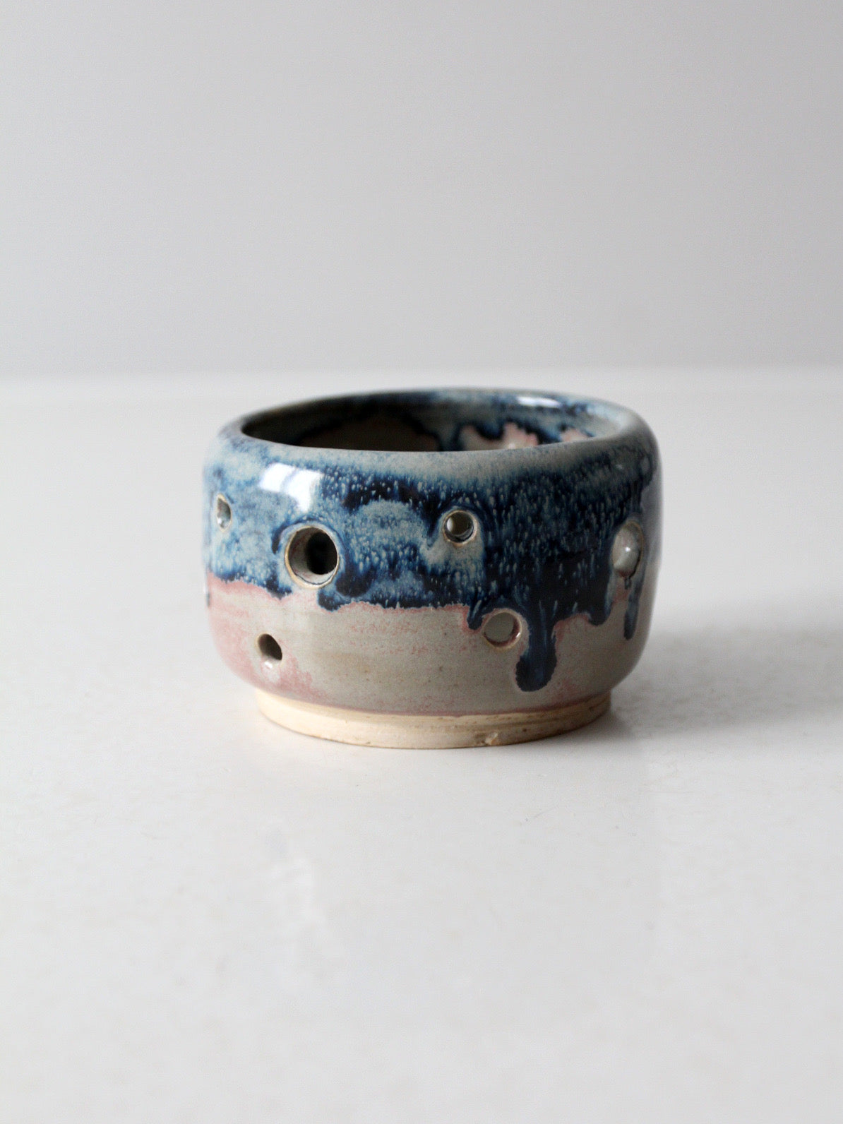 vintage studio pottery bowl with cutout design