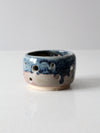 vintage studio pottery bowl with cutout design