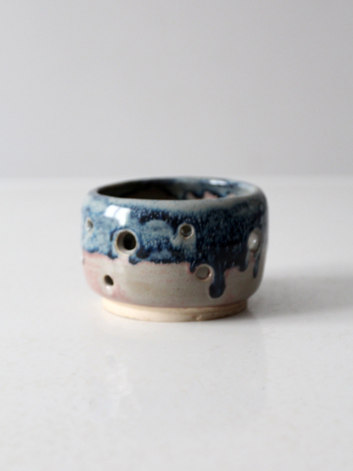 vintage studio pottery bowl with cutout design