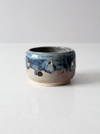 vintage studio pottery bowl with cutout design