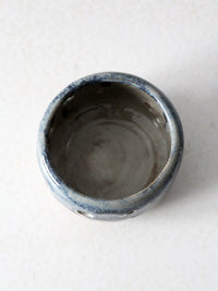 vintage studio pottery bowl with cutout design