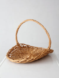 large vintage wicker gathering basket