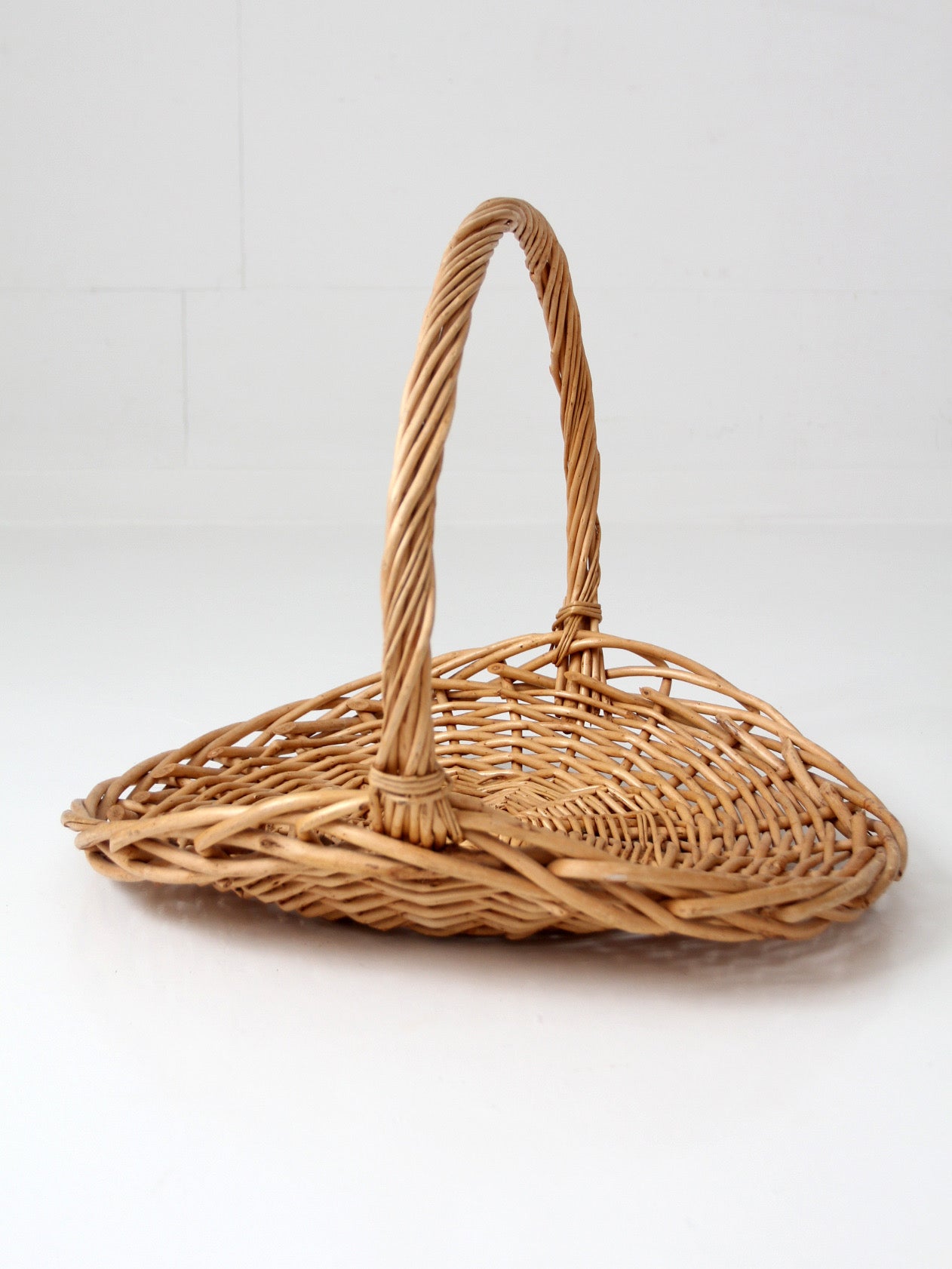 large vintage wicker gathering basket