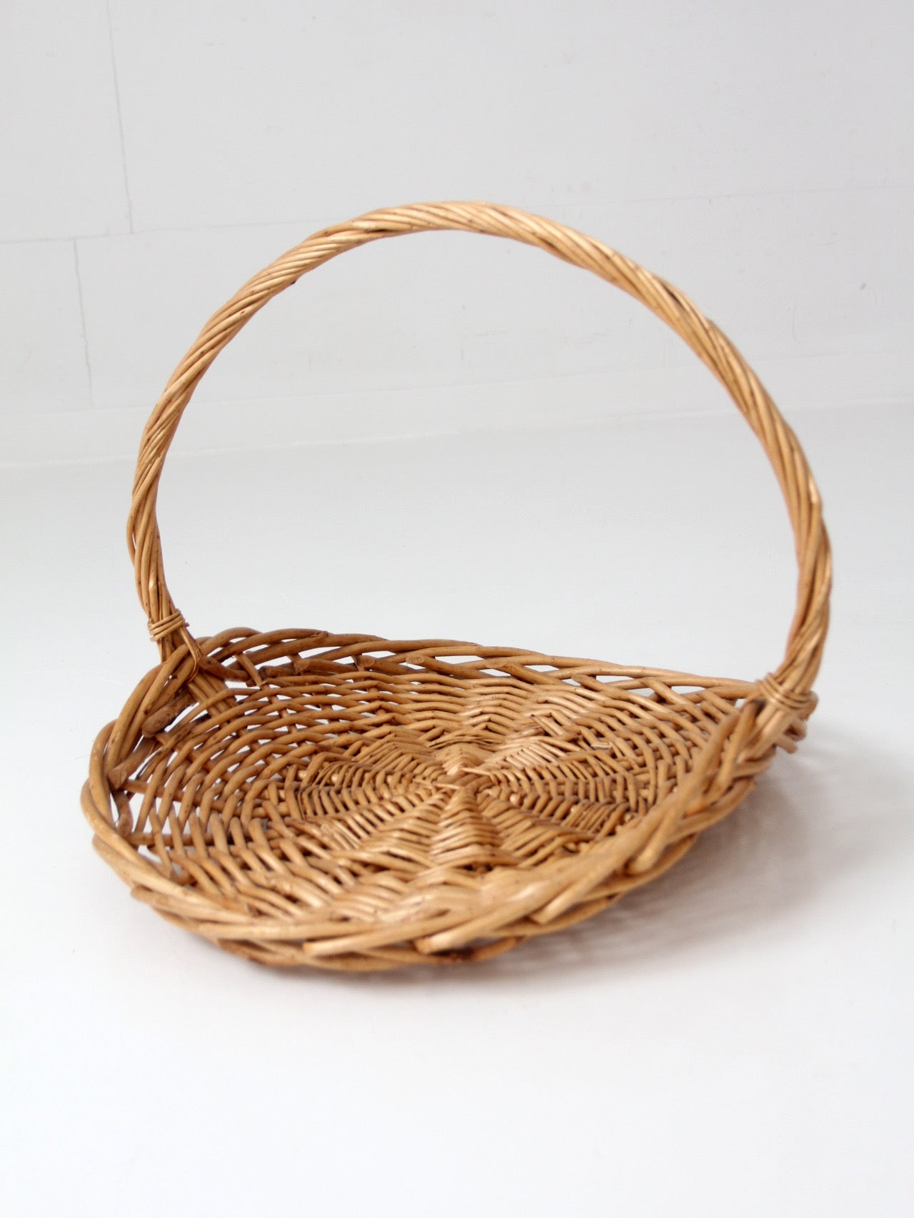 large vintage wicker gathering basket