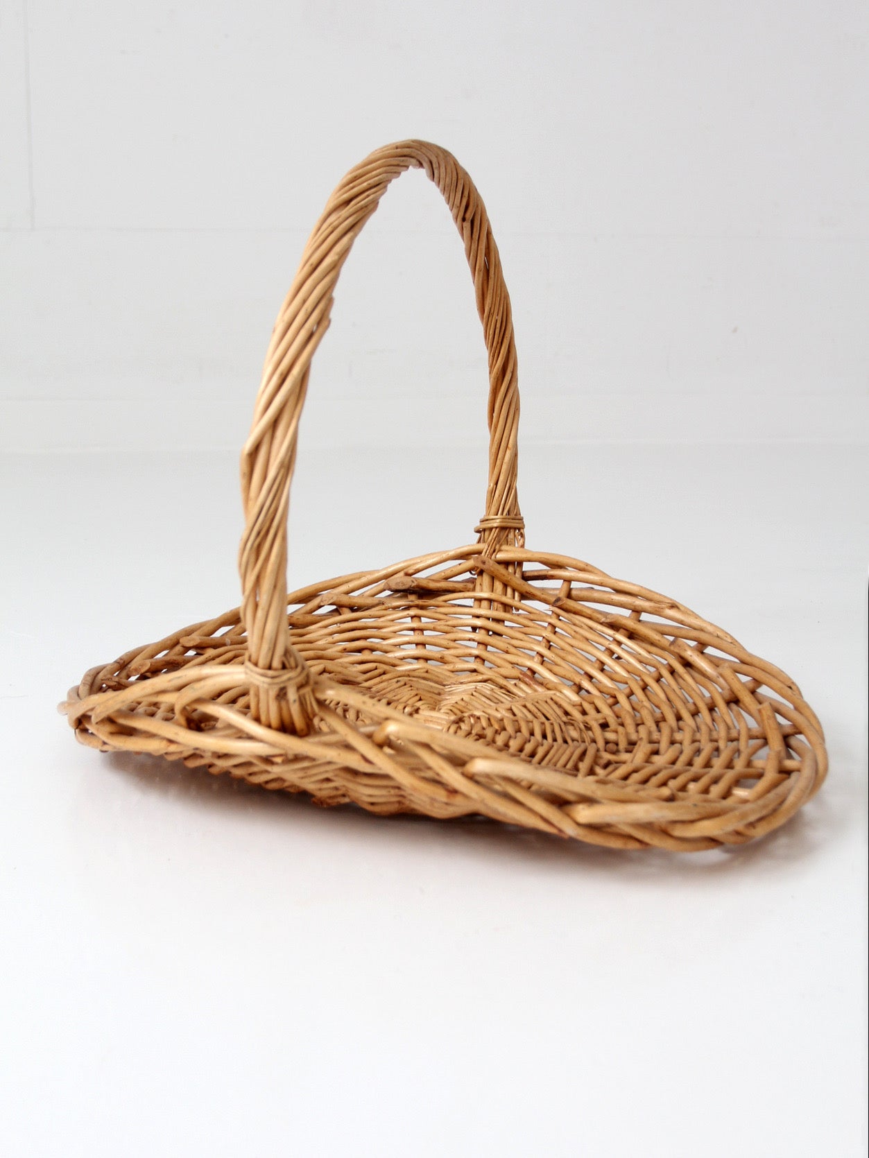 large vintage wicker gathering basket