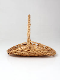 large vintage wicker gathering basket